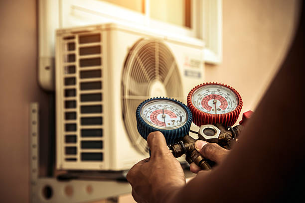 Professional Air Conditioning Service technician working in Randolph, NJ